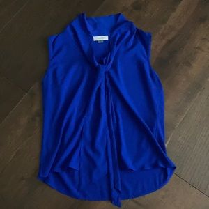 Blue sleeveless blouse
